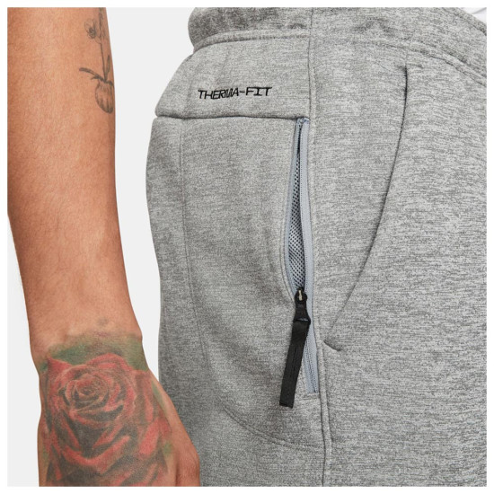 Nike Ανδρικό παντελόνι φόρμας Therma-FIT Tapered Fitness Pants